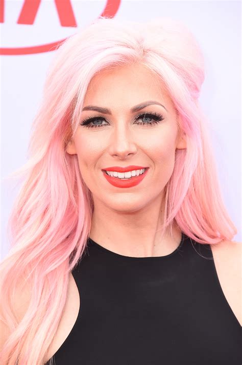 The hair is cut in sliced layers, which create vertical movement with heavily textured tips removing bulk. Expert look on Pink hair - HairStyles for Women