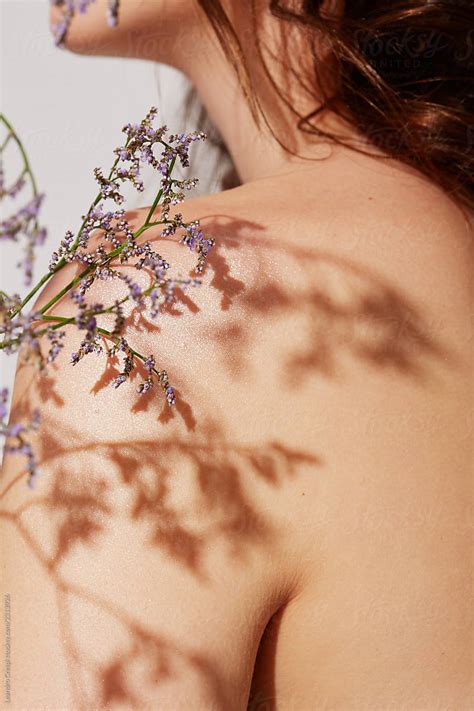 Skin Detail With Flowers By Stocksy Contributor Ohlamour Studio