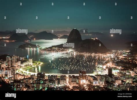Night View Of Sugarloaf Mountain And Botafogo In Rio De Janeiro With
