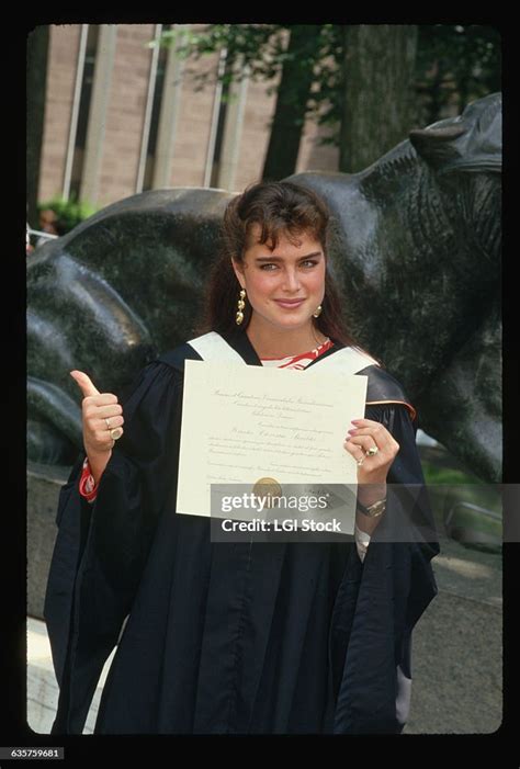 Brooke Shields Holds Her Diploma From Princeton University On Her