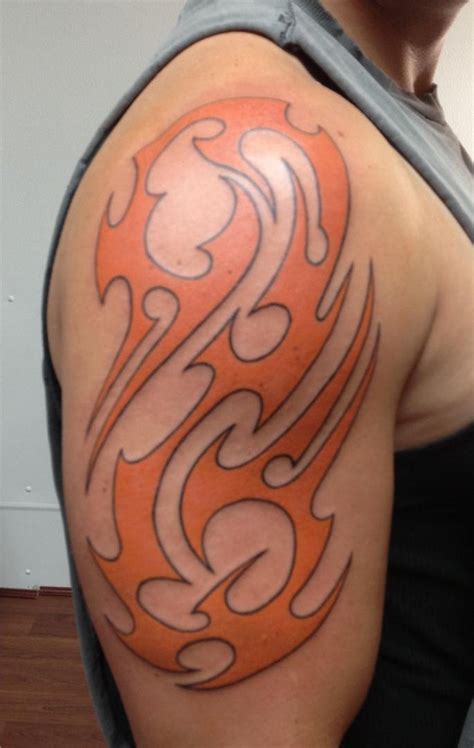 Tree tattoo covering the sleeve, shoulder and chest of men. 19 Unique Colorful Tribal Tattoos