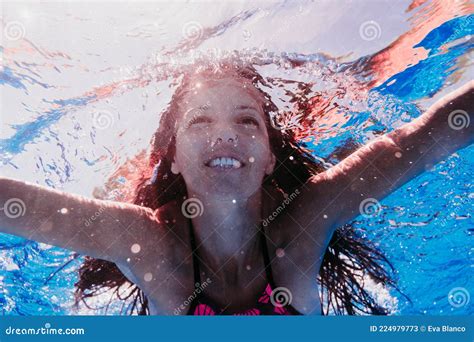 Happy Caucasian Woman Diving In Swimming Pool Underwater View Stock Image Image Of Floating