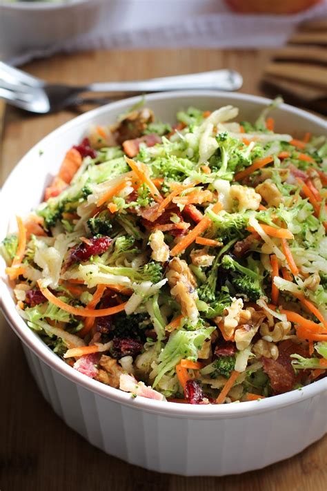 This broccoli salad is packed with apples, pears, pecans, blue cheese crumbles, and mixed with homemade apple vinaigrette. Grated Broccoli Salad with Carrots, Apples, and Warm Bacon ...
