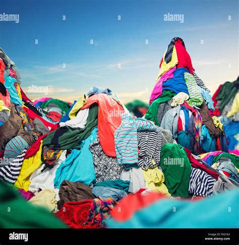 Big Heap Of Colorful Clothes On Sky Background Stock Photo Alamy