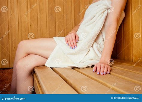 Redhaired Ginger Woman Relaxing In A Russian Banya Sauna Pampering