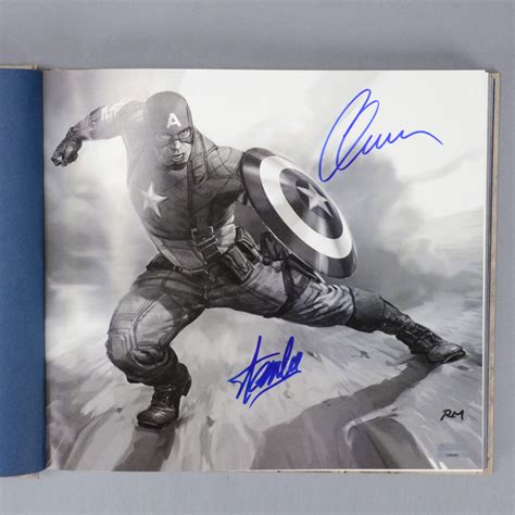 Lot Detail Chris Evans And Stan Lee Autographed The Art Of Captain America The First Avenger