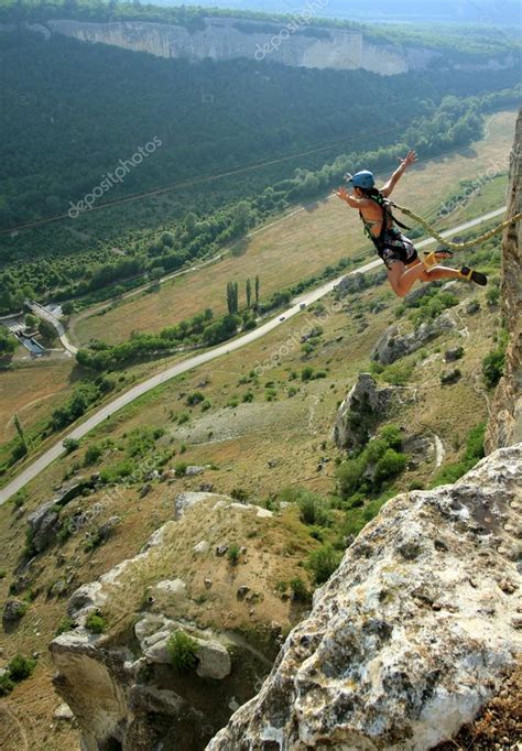 La ciudad turística de está ubicado en un valle con cascadas y aguas termales a lado del volcán tungurahua con una altura de 5.016 metros. Bungee jumping sequence in Banos de Agua Santa,Ecuador, San Francisco bridge — Stock Photo ...