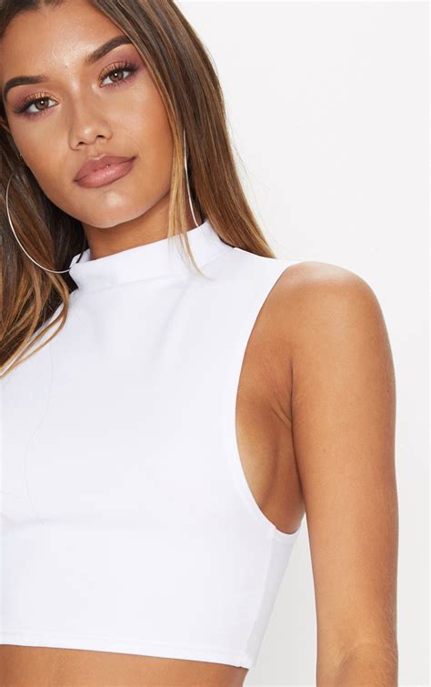 white high neck sleeveless crop top tops prettylittlething ie