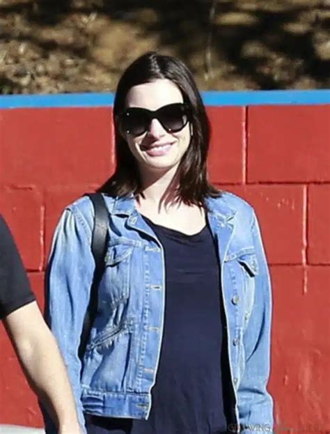 A Newly Pregnant Anne Hathaway Steps Out With Her Husband