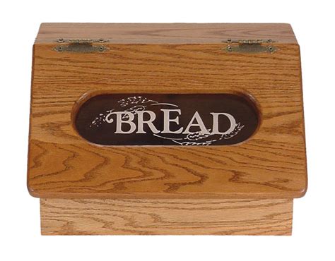 The finish will have to stand up to this kind of abuse. Amish made Solid Oak Bread Box with Slant Top