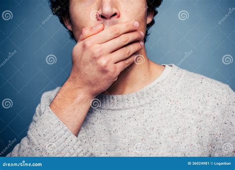 Shocked Young Man With His Hand On His Mouth Stock Image Image Of