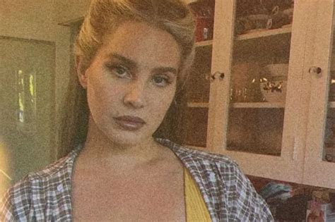 Lana Del Reys Hottest Snaps Stripping Off Braless Chic And Plunging