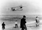 December 17, 1903 - Orville Wright maneuvers the Wright Flyer as it ...