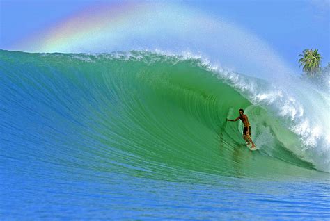 Tropical Island Surfing Rainbow Photograph By Paul Kennedy
