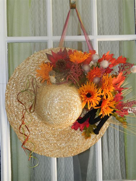 A Fall Hat Door Decoration Made With A Straw Hat From Michaels And