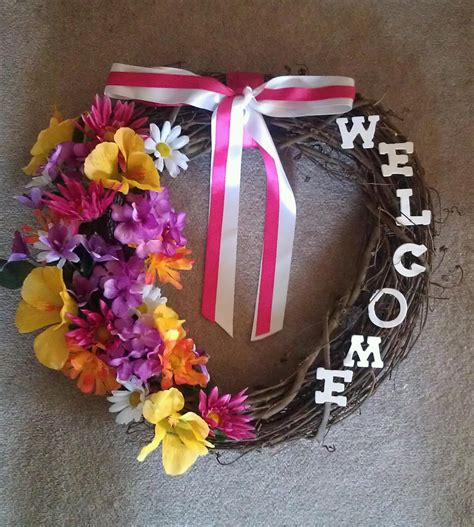 The wicker styling adds a casual style element that is reminiscent of the beach or cottage chic, and the color can be changed with paint as needed. wreath... dollar store flowers, letters, wreath and ribbon ...