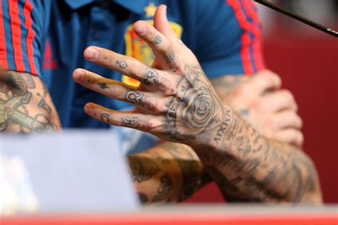 The Heavily Tattooed Hands Of Spain Captain Sergio Ramos During The