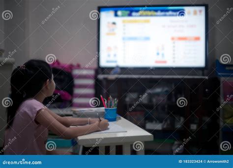 Little Child Girl Learning On Dltv Or Distance Learning Television At