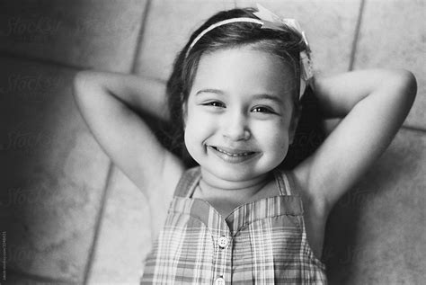Black And White Portrait Of A Beautiful Young Girl Smiling By Stocksy Contributor Jakob