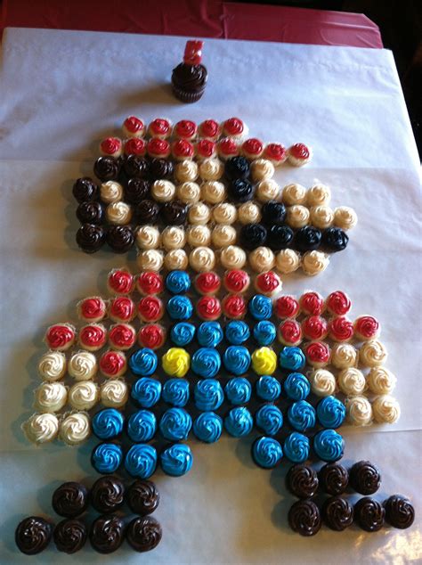 Download mario cupcakes ideas and share image with your friends and family members. Wyatt's Mario Birthday Mini Cupcakes :) | Mario birthday, Super mario bros birthday party, Super ...