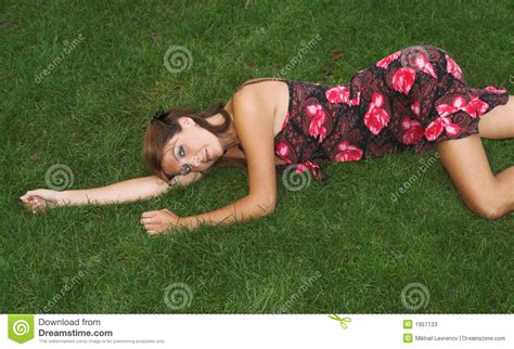 Pretty Brunette Lying On The Grass Stock Image Image Of Brunette Laying 1957133