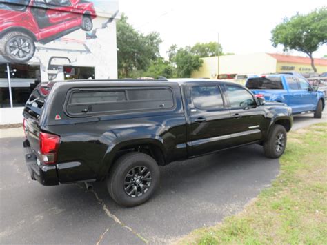 2020 Black Toyota Tacoma With Leer 100xr And Windoor Sliders