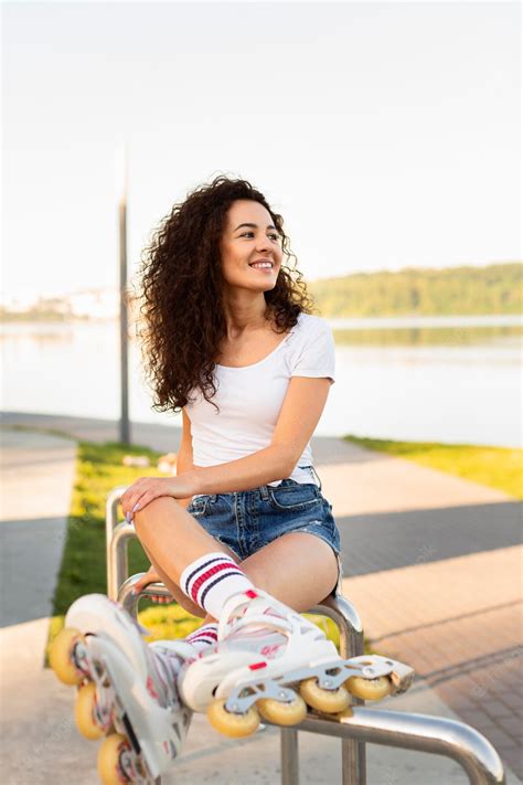Free Photo Beautiful Girl Posing With Her Rollerblades Outdoors