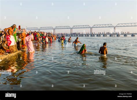 People Taking Bath Early Morning At The Sangam The Confluence Of The