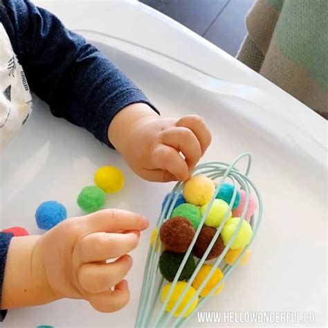 Sticky Wall Yarn Sensory Activity For Babies And Toddlers Hello Wonderful