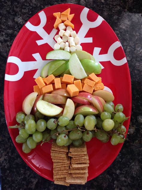 This fruit tray for christmas is shaped like a christmas wreath, and is easy to make with grapes looking for more christmas fruit tray inspiration? Christmas fruit and cheese platter | Christmas food, Christmas fruit, Christmas treats