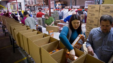 All of our work is done by volunteers. Volunteer spirit in full swing at Food Bank of Alaska ...