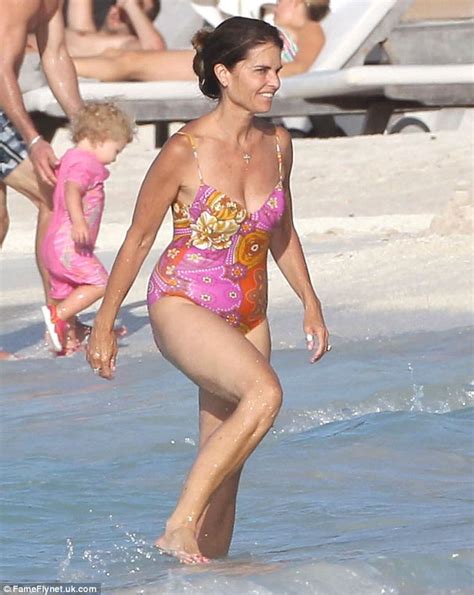 Maria Shriver Shows Off Her Trim Figure In Pretty Printed Swimsuit As She Takes A Dip In St