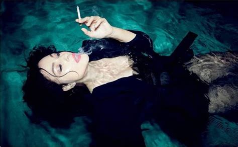 monica bellucci stuns in new wet and sexy photoshoot 8 pics