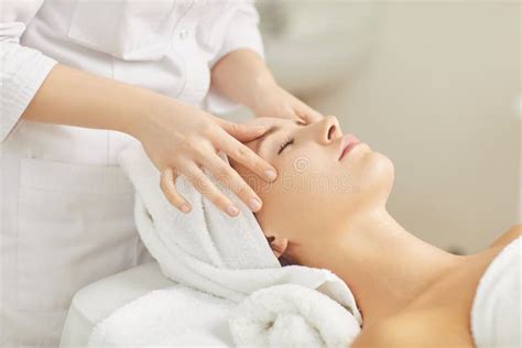 Beautician Makes Facial Massage To The Girl Stock Photo Image Of Face