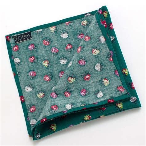 Roll the napkin into a narrow cone and tuck in the ends. 1940s Emerald Rosebud Pocket Square | Pocket square, Rose buds, Square