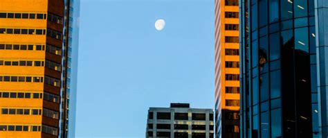 Download Wallpaper 2560x1080 Buildings Skyscrapers Moon City