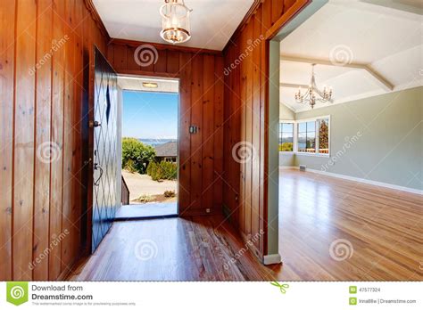 Doors that open into these areas might also knock into those walking by. Entry Hallway With Open Door Stock Photo - Image of ...