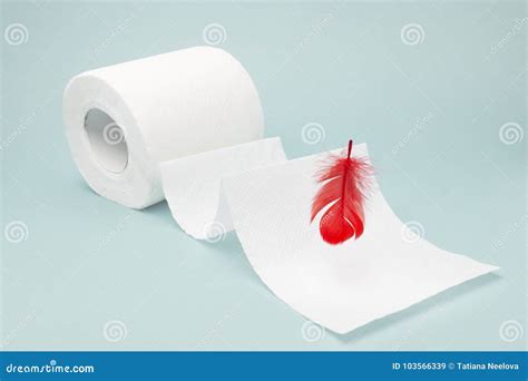 A Photo Of Red Feather Flying Above A Toilet Paper Roll Hemorrhoids