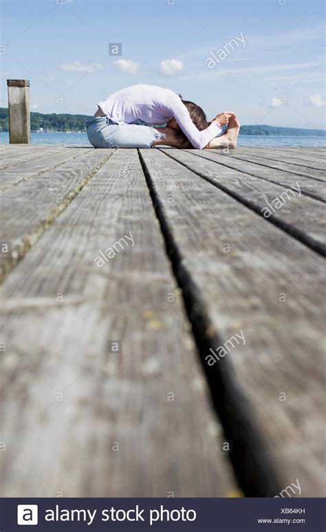 Woman Bending Over Touching Toes High Resolution Stock Photography And