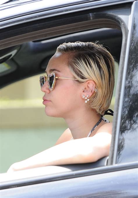 Miley Cyrus Shows Off Pink Armpit Hair In Mens Sneakers