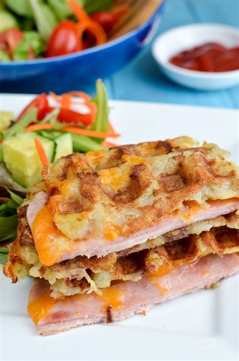 Shredded hash browns, ham, eggs, and cheese are cooked in a waffle iron. Syn Free Cheese and Ham Stuffed Hash Brown Waffle ...