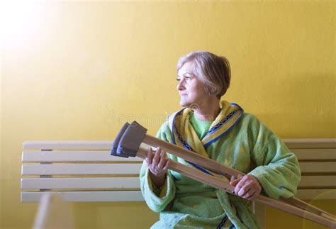 Woman With Crutches Stock Photo Image Of Corridor Mature 51197302