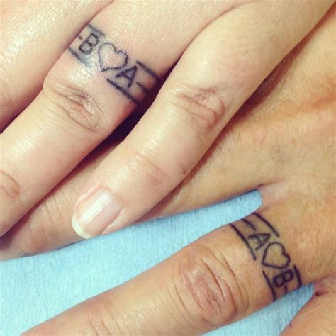 Initials And Heart Engagement Tattoos Wedding Ring Finger Tattoos