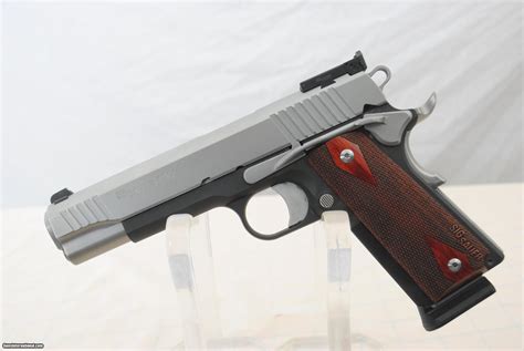 No live ammunition in inspection area. SIG SAUER 1911 - 45 ACP - TWO TONE MODEL - AS NEW