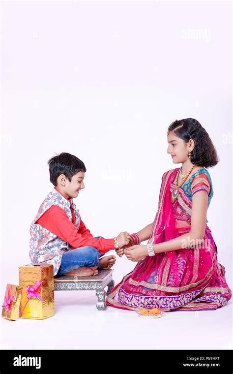Cute Indian Brother And Sister Celebrating Raksha Bandhan Festival