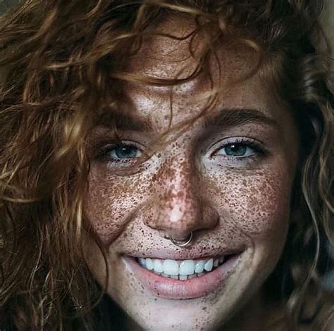 Beautiful Woman With Freckles And Red Hair