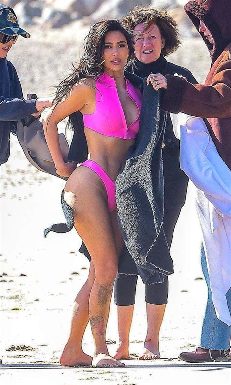 Kim Kardashian Wears Pink Bikini For Beach Photo Shoot W