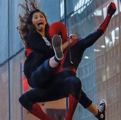 Zendaya and tom holland in spiderman suit swing into action up in the air as they are lifted with wires while filming spiderman Happy Birthday Zendaya!!! : Spiderman