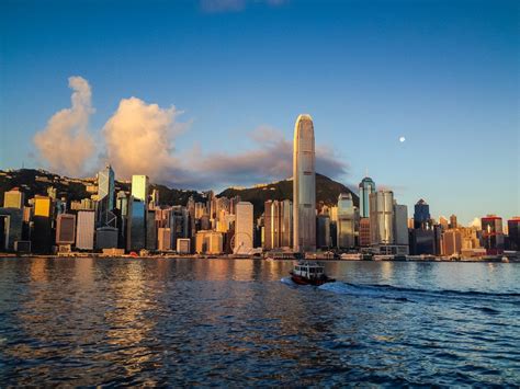 The Sunrise And Moonset Of Hong Kong Skyline Smithsonian Photo