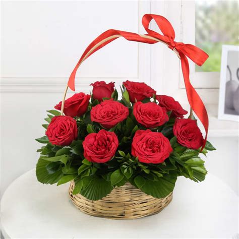 Order Red Roses 10 Stems In A Round Basket With Handle Online At Best Price Free Deliveryigp